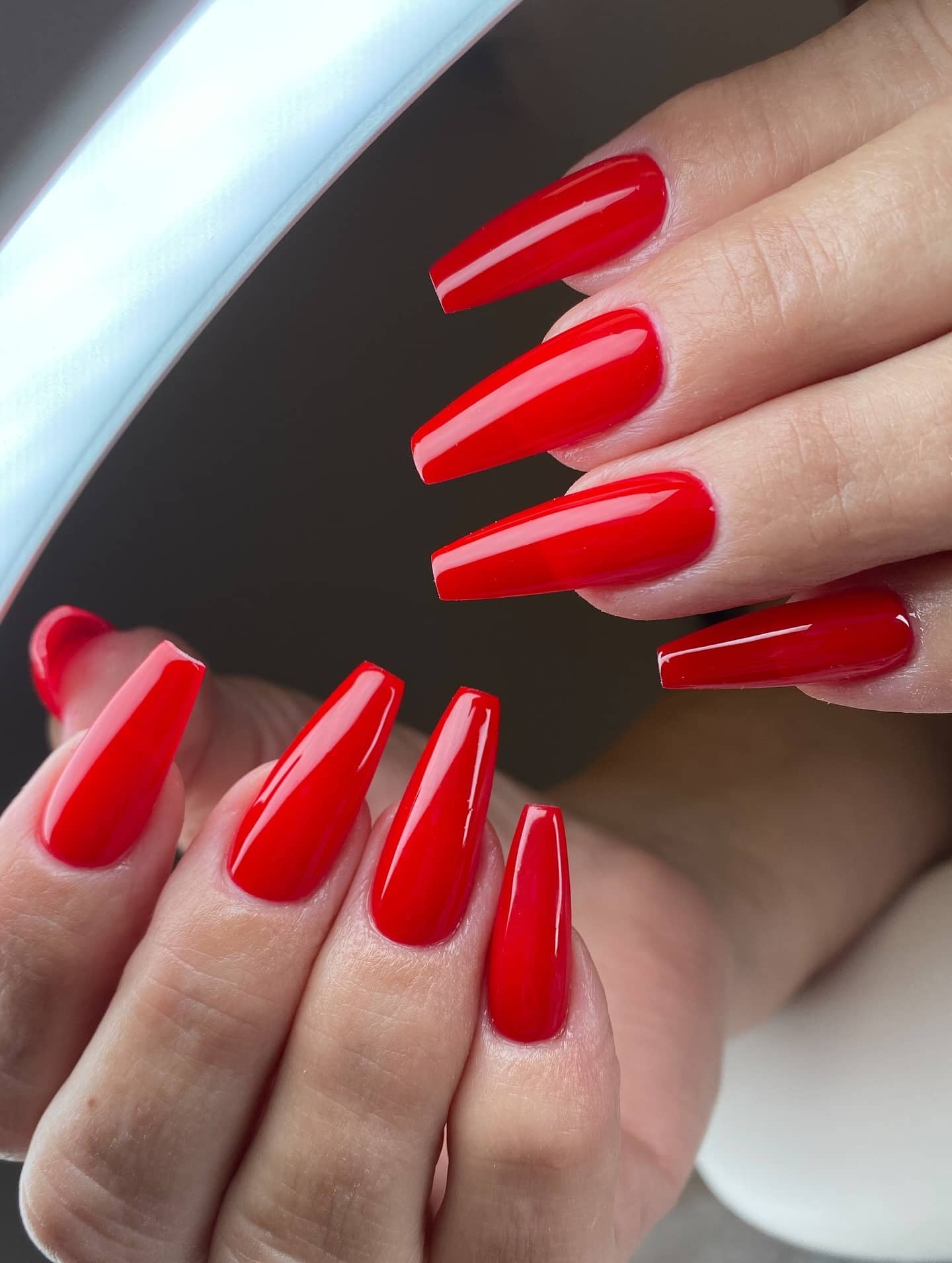 21. Glossy Cherry Red Coffin Nails - coffin nail ideas