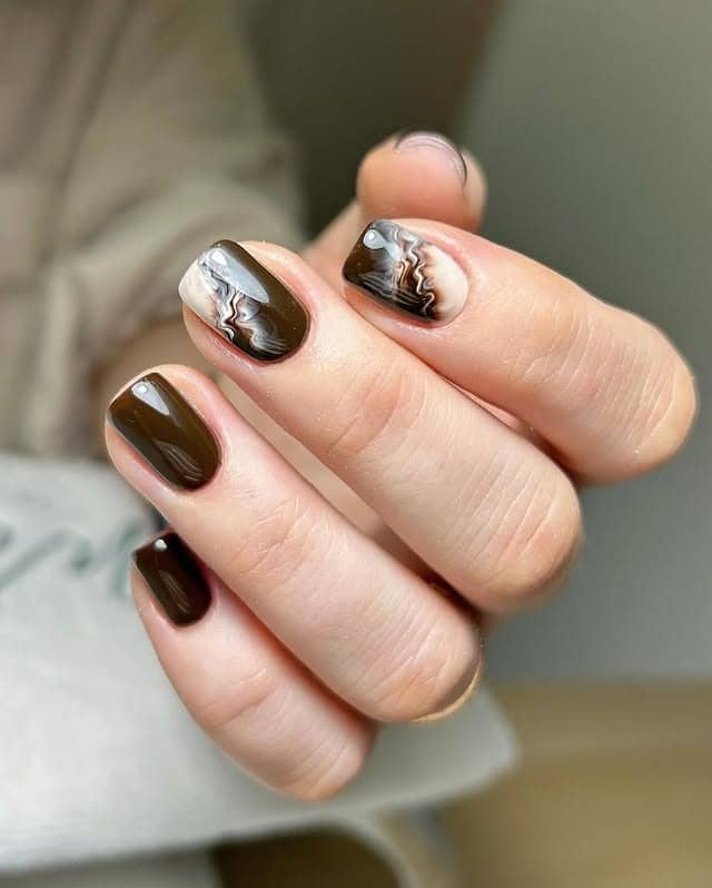 14. Chocolate Marble Short Nails - winter almond nail ideas