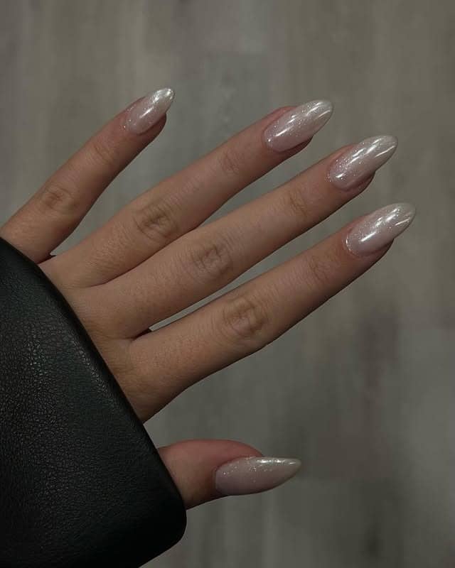 16. Pearl Shimmer Almond Nails - winter almond nail ideas