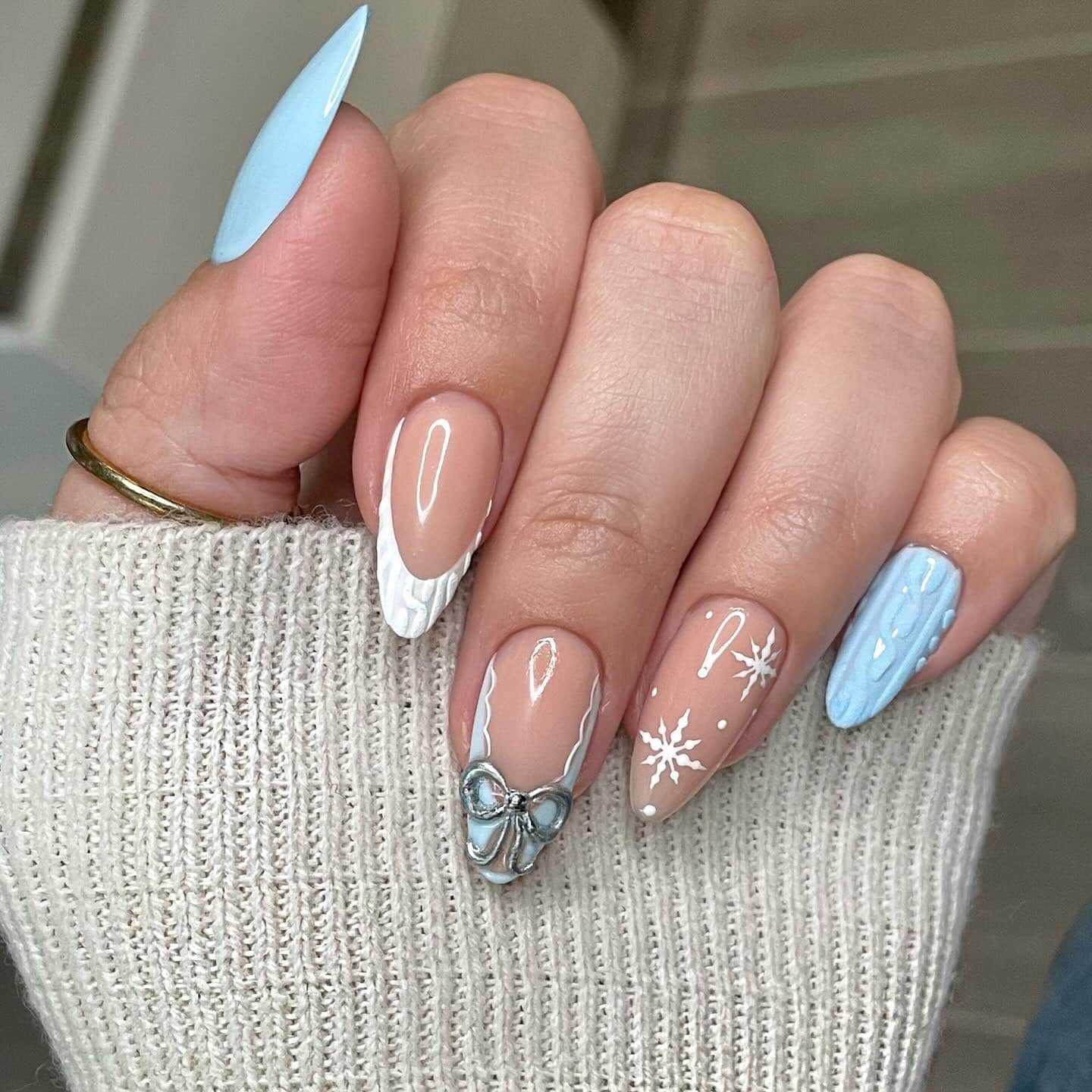 19. Icy Blue Sweater Accent Almond Nails - winter almond nail ideas