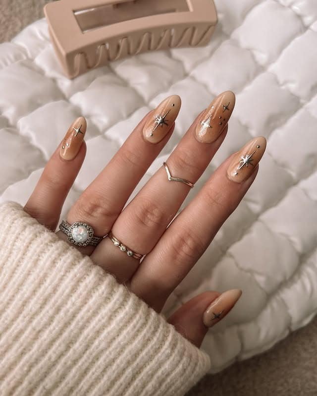 20. Nude Starburst Almond Nails - winter almond nail ideas