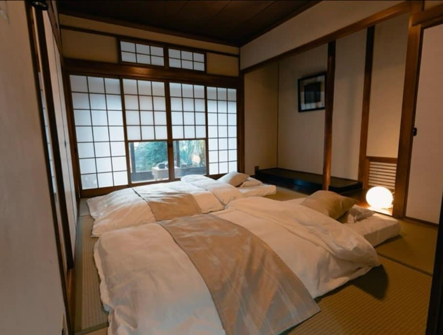 2. Traditional Japanese Tatami Bedroom in Warm Neutrals - japanese bedroom ideas