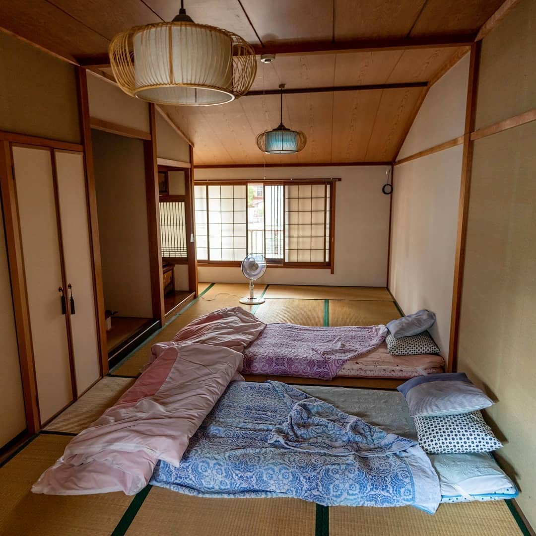 4. Minimal Tatami Sleeping Room with Natural Wood Tones - japanese bedroom ideas