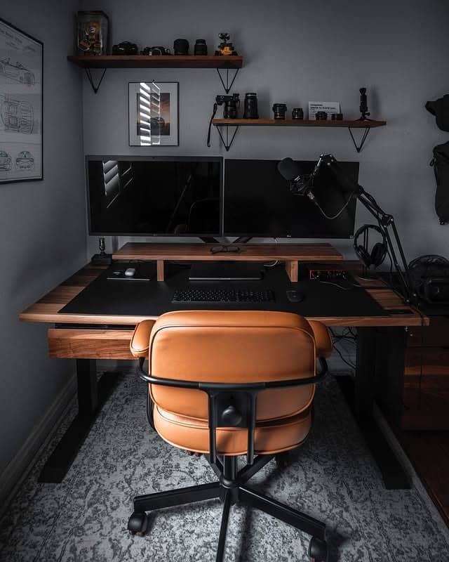12. Charcoal Tech Workspace With Walnut Desk - dark office ideas