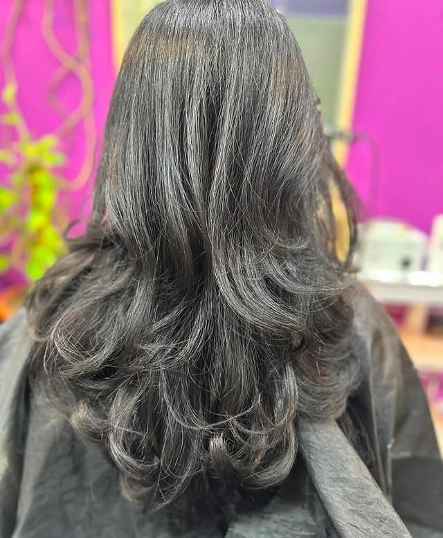 1. Soft Feather Layers with Natural Black Hair - Feather Haircut