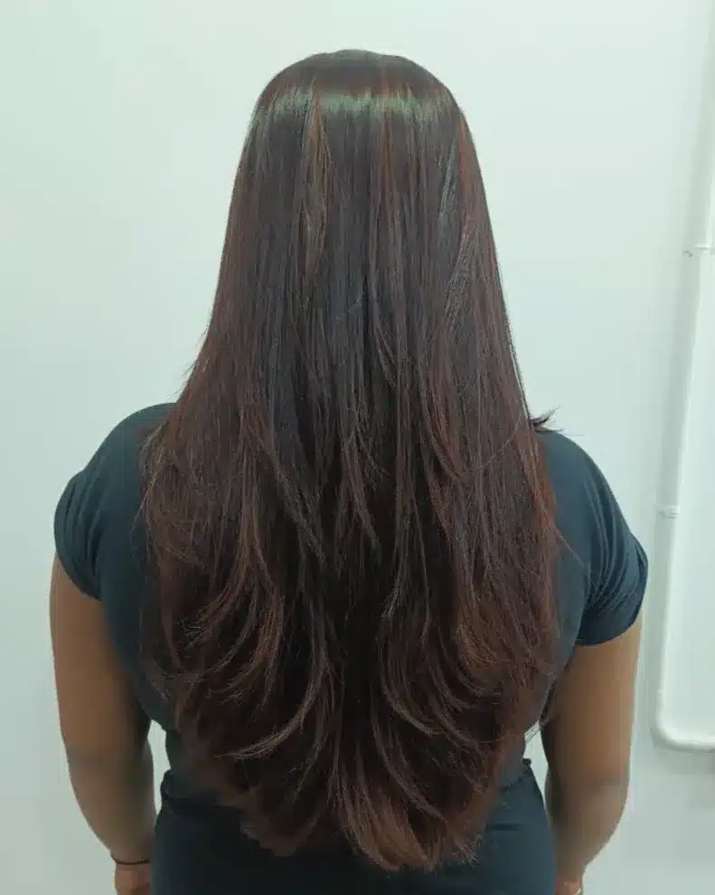4. Long Feather Haircut with Dark Chocolate Brown Highlights - Feather Haircut