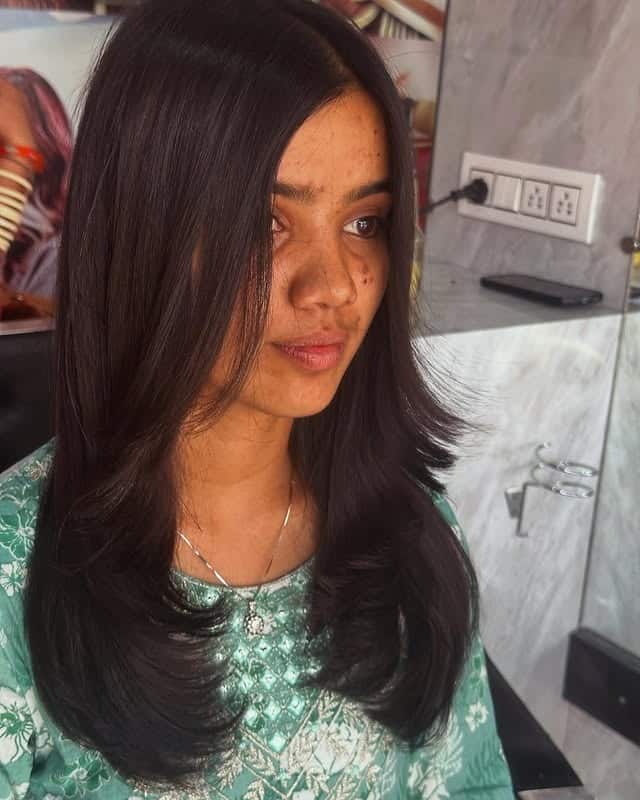 10. Soft Feather Layers with Deep Brown Hair - Feather Haircut