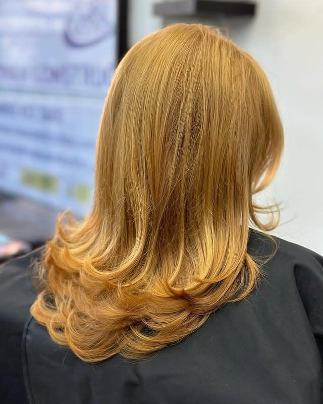 15. Honey Blonde Feather Layers with Curled Ends - Feather Haircut