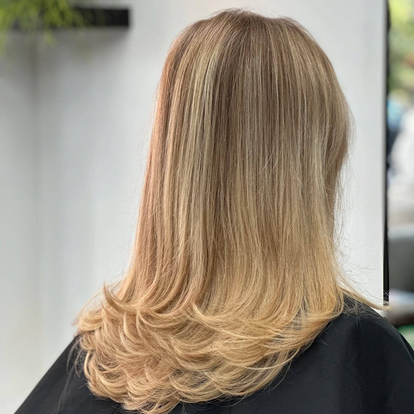 16. Champagne Blonde Feather Haircut with Soft Layers - Feather Haircut