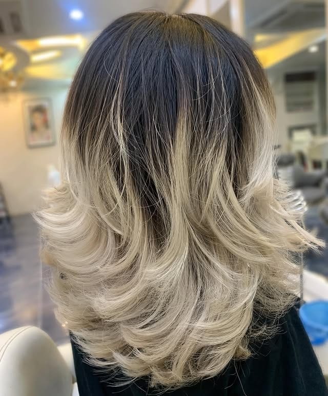 17. Feathered Ombre Layers with Black and Platinum Blonde Hair - Feather Haircut