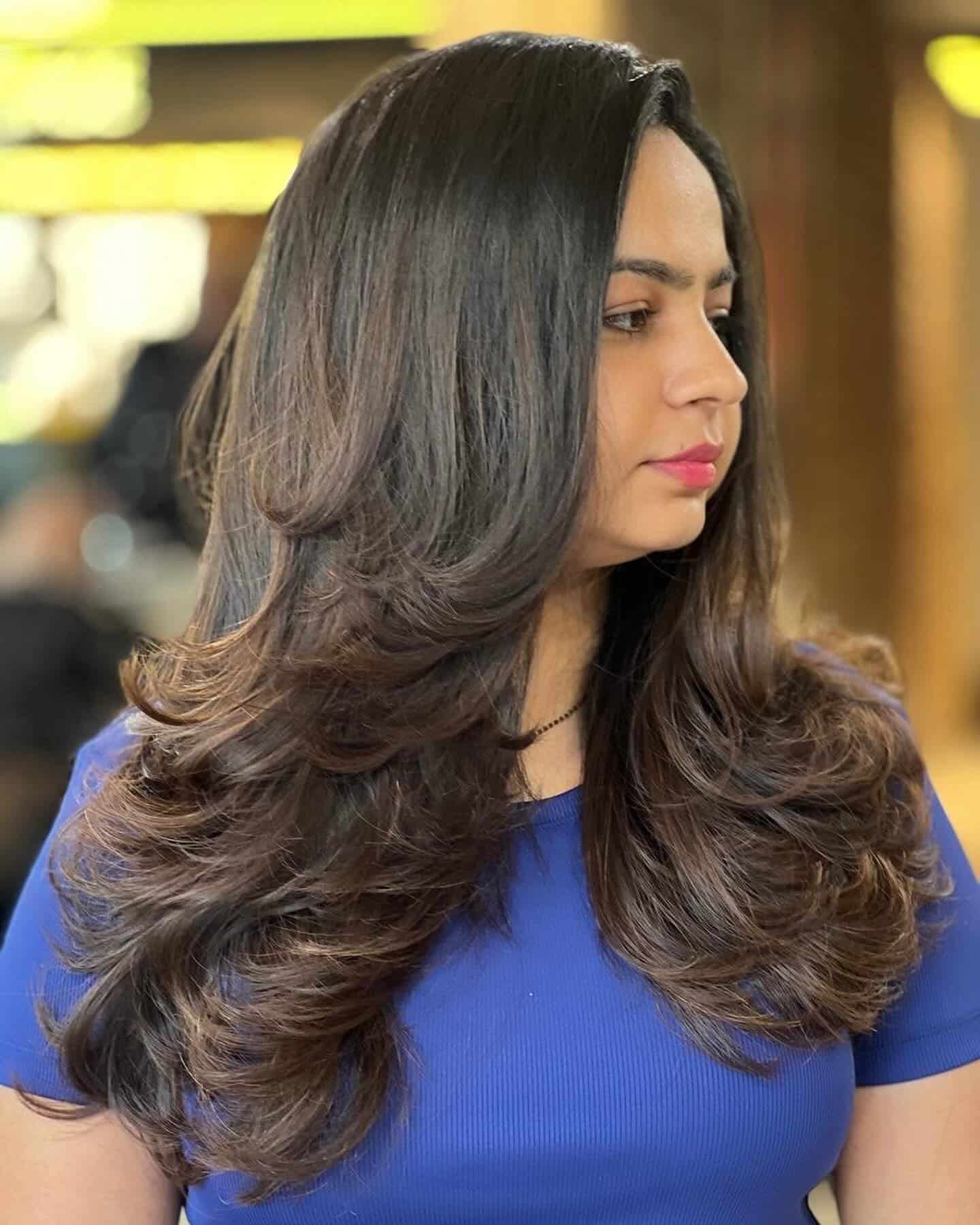18. Voluminous Feather Cut with Dark Chocolate Brown Hair - Feather Haircut