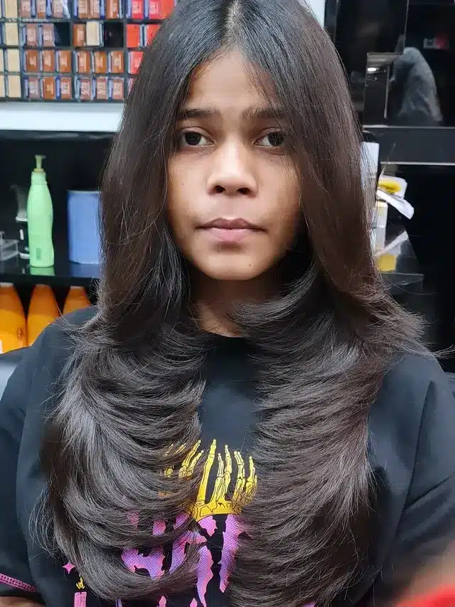 19. Face-Framing Feather Layers with Soft Black Hair - Feather Haircut