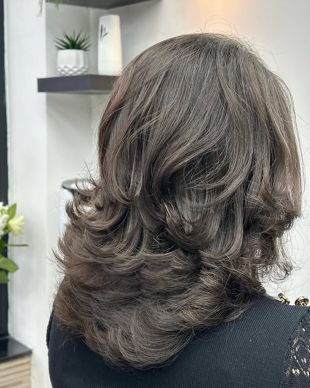 20. Textured Feather Blowout with Smoky Brown Hair - Feather Haircut