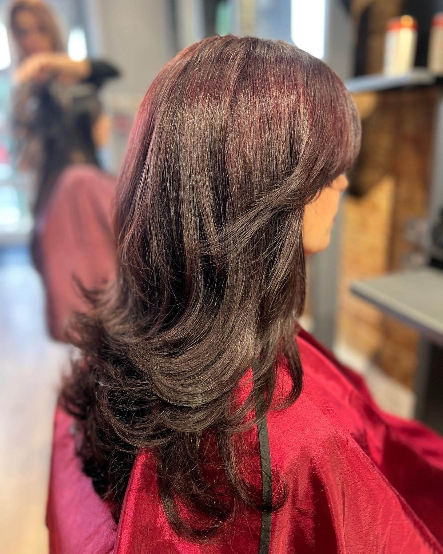 21. Layered Feather Cut with Burgundy Black Hair - Feather Haircut