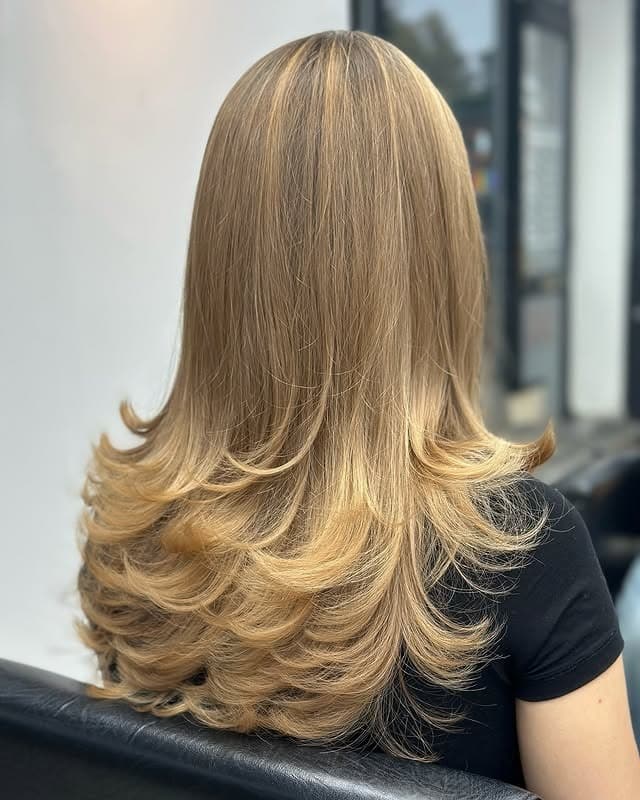 22. Feathered Blonde Layers with Vanilla Beige Hair - Feather Haircut