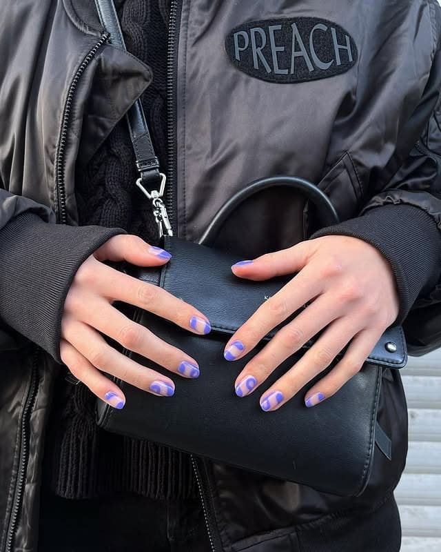 6. Abstract Violet Swirl Nails - purple nail ideas