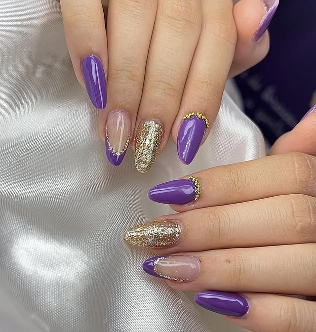 12. Royal Purple Glitter Almond Nails - purple nail ideas
