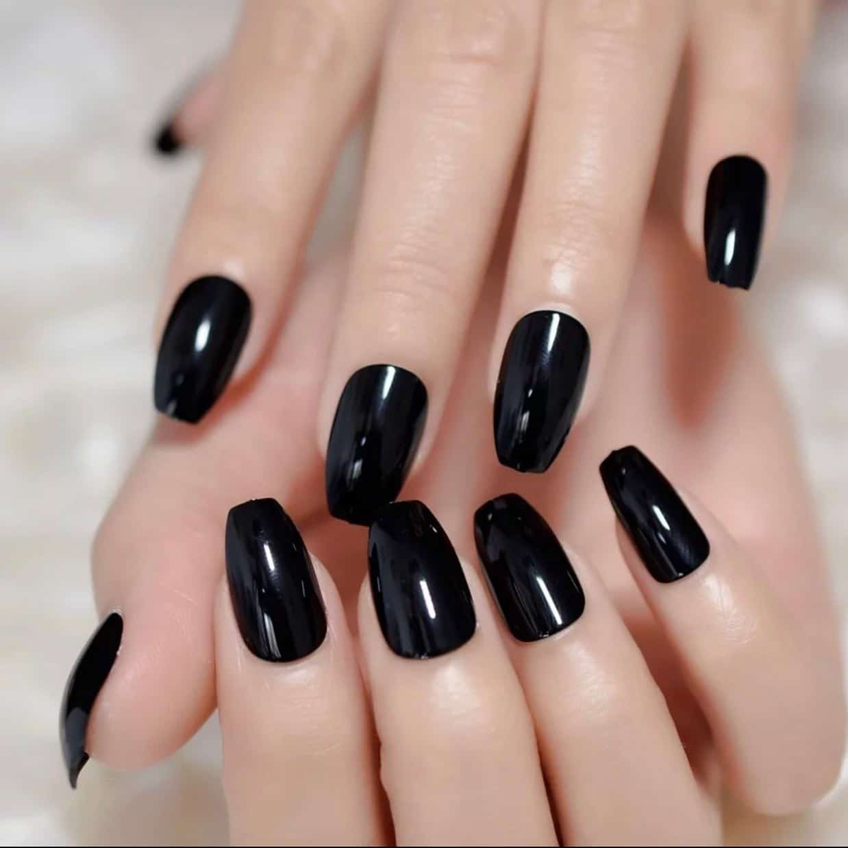 1. Glossy Jet Black Short Coffin Nails - short black coffin nail ideas