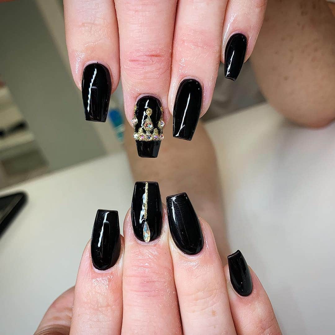 4. Black Coffin Nails with Rhinestone Accent - short black coffin nail ideas