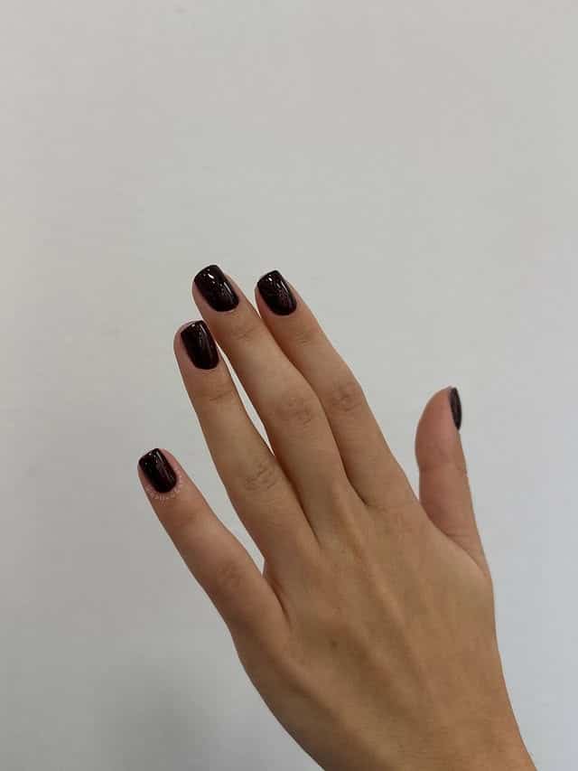 5. Short Black Natural Nails - short black coffin nail ideas