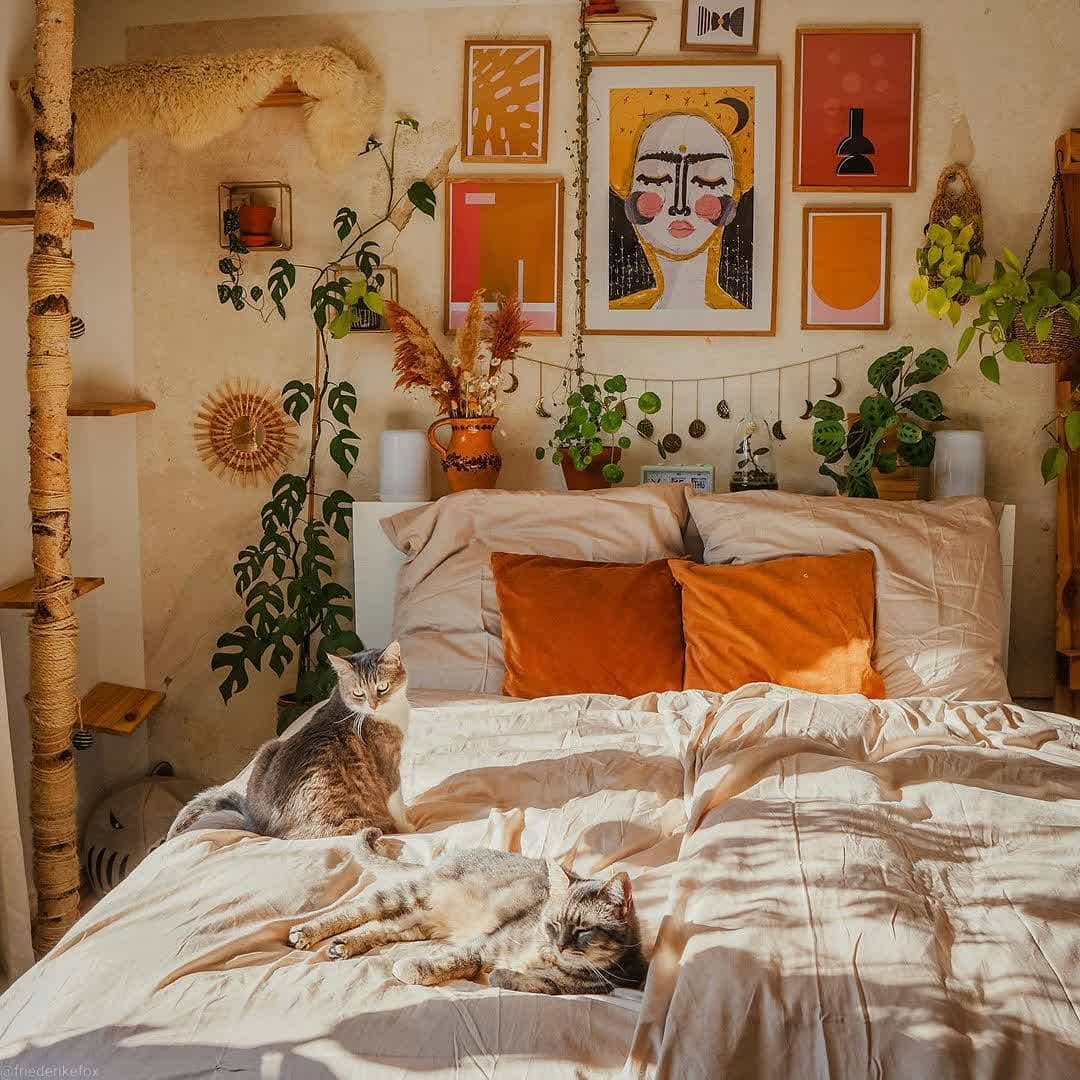 7. Artistic Boho Bedroom with Warm Amber Accents - boho bedroom ideas
