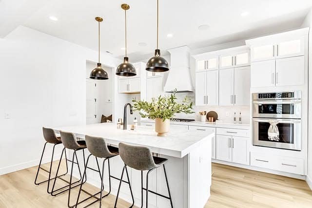 7. Contemporary White Kitchen With Black Pendant Lighting - white kitchen ideas