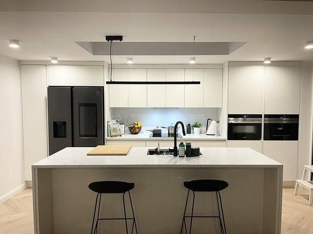 17. Contemporary White Kitchen With Matte Black Details - white kitchen ideas