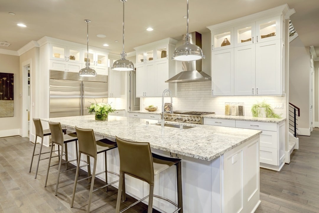 20. Luxury White Kitchen With Marble Countertops - white kitchen ideas