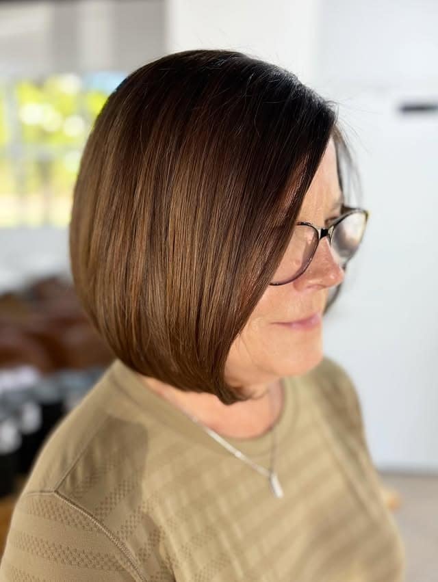 5. Soft Chestnut Side-Part Bob - Classic Bob Cut