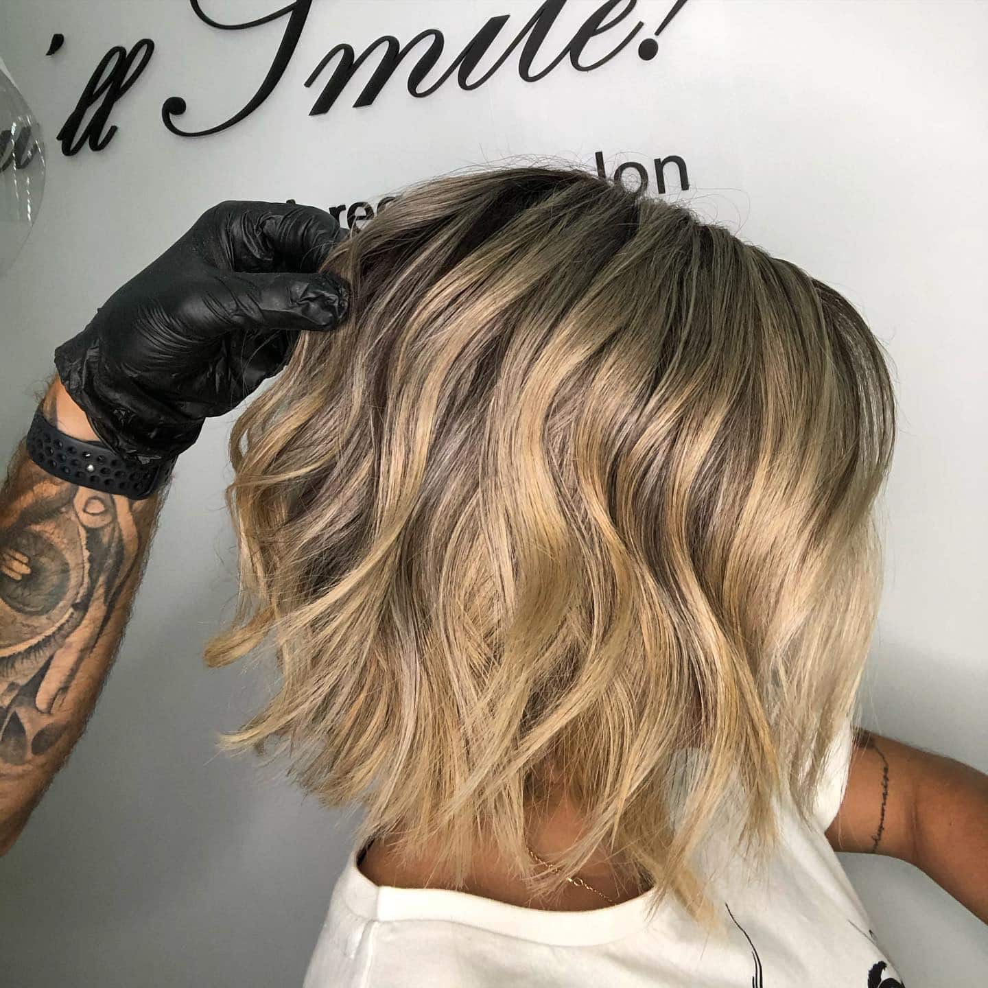 7. Textured Blonde Balayage Wavy Bob - Classic Bob Cut