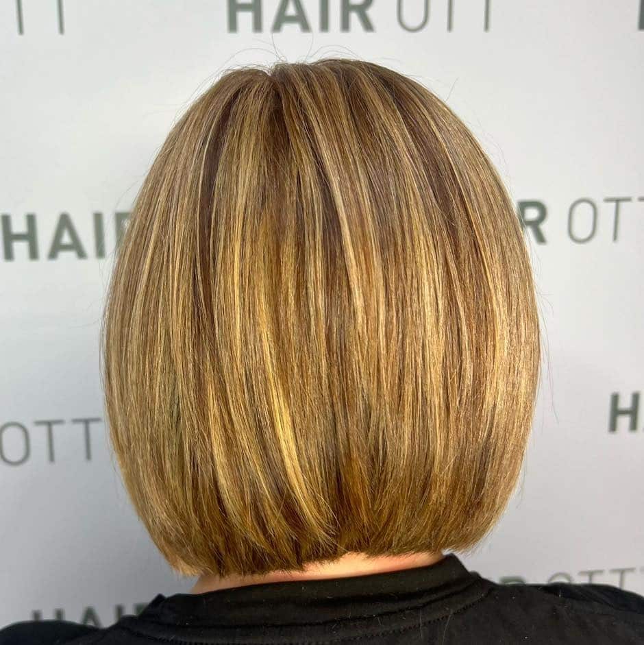 10. Golden Honey Blonde Rounded Bob - Classic Bob Cut
