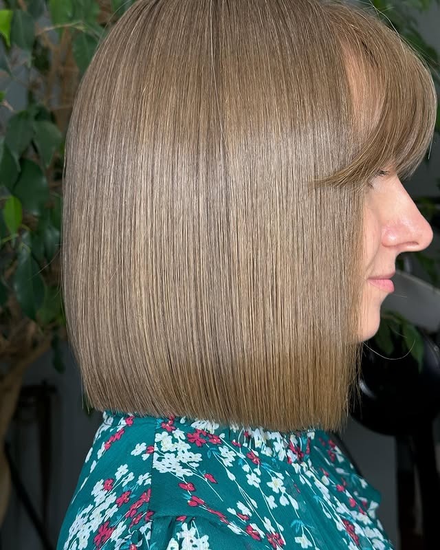 14. Sandy Beige Blunt Bob with Bangs - Classic Bob Cut