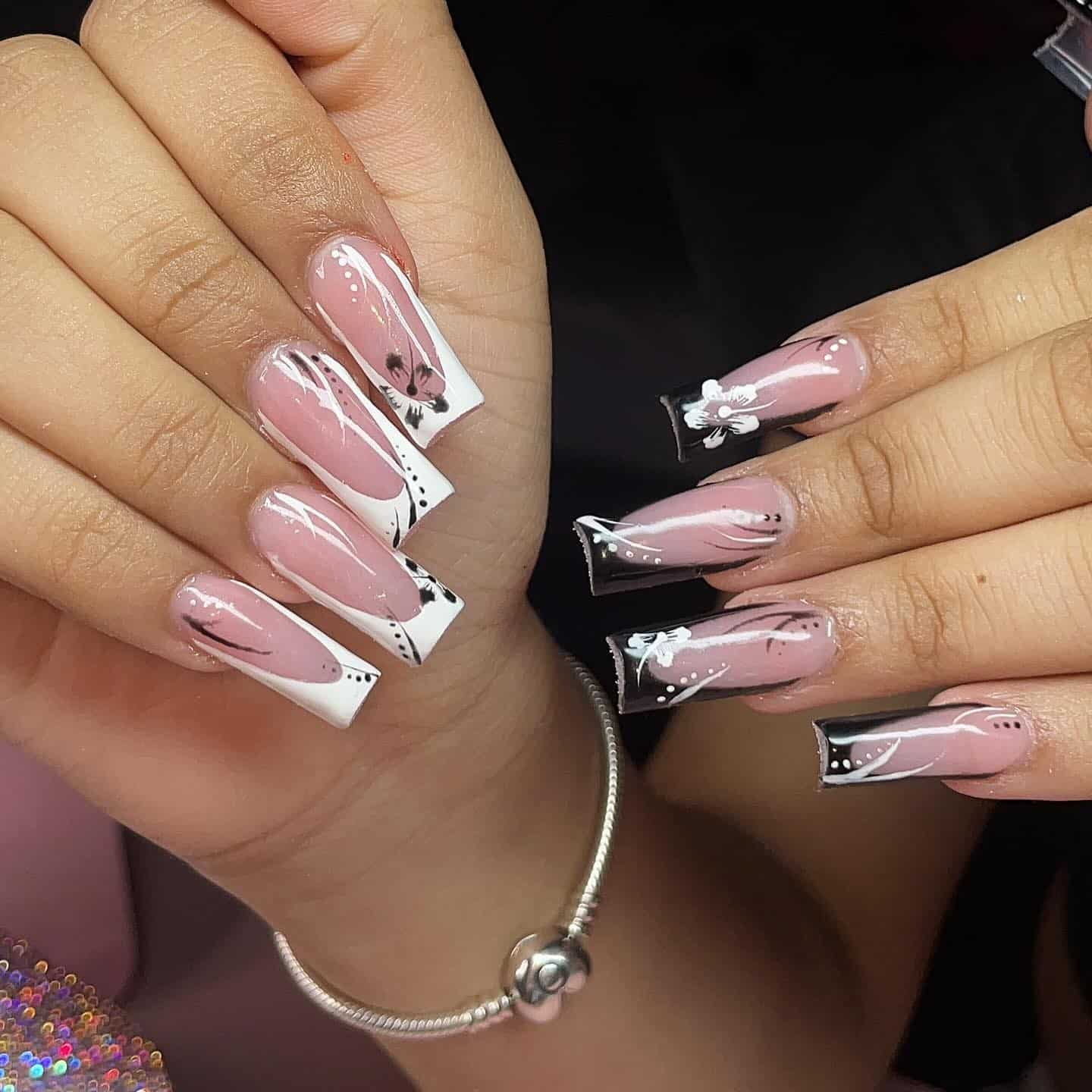 2. Abstract Black and White Floral Coffin Nails - black and white nail ideas