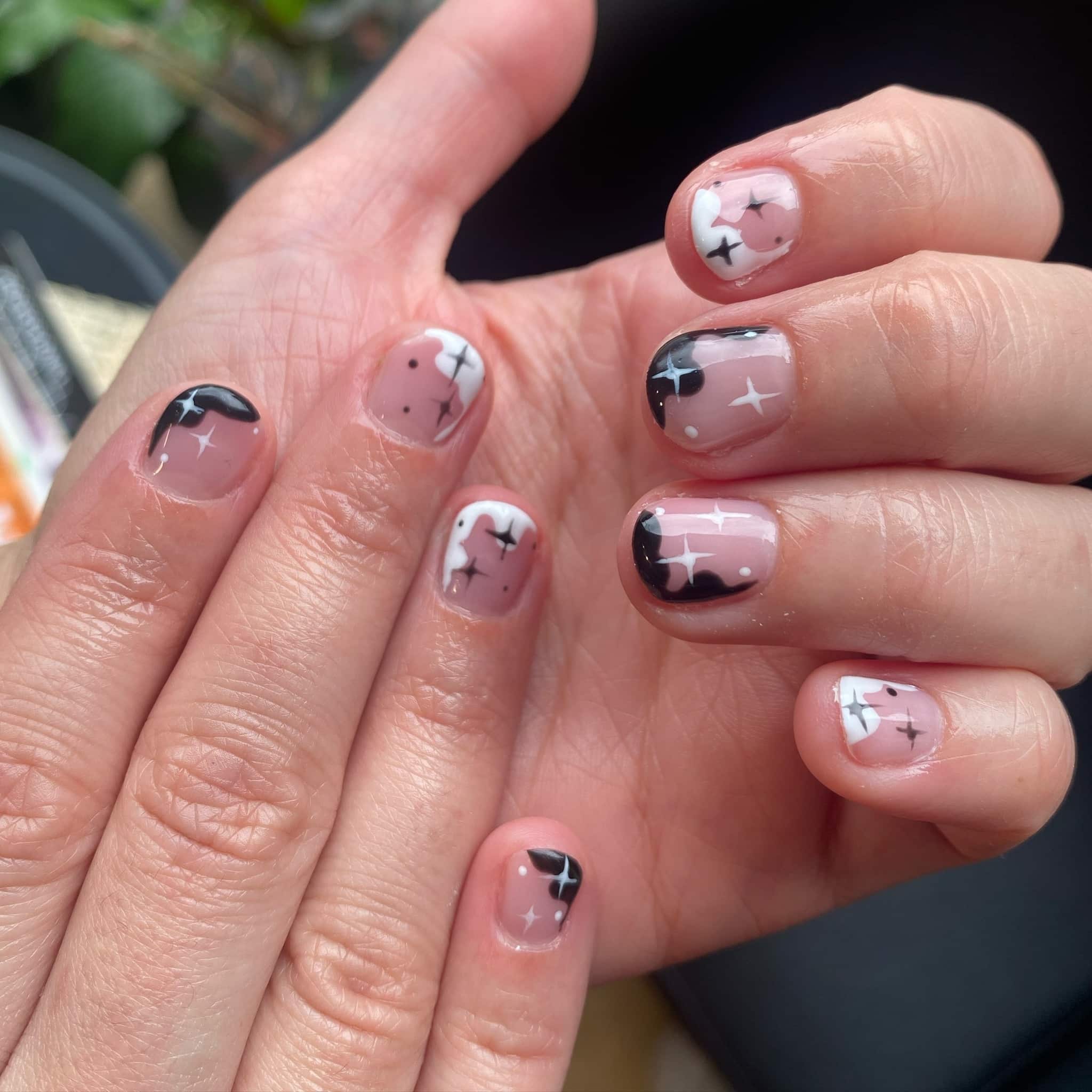 10. Black and White Celestial Short Nails - black and white nail ideas