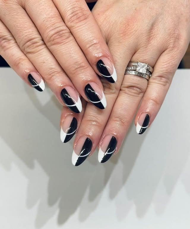 13. Black and White Curved French Almond Nails - black and white nail ideas