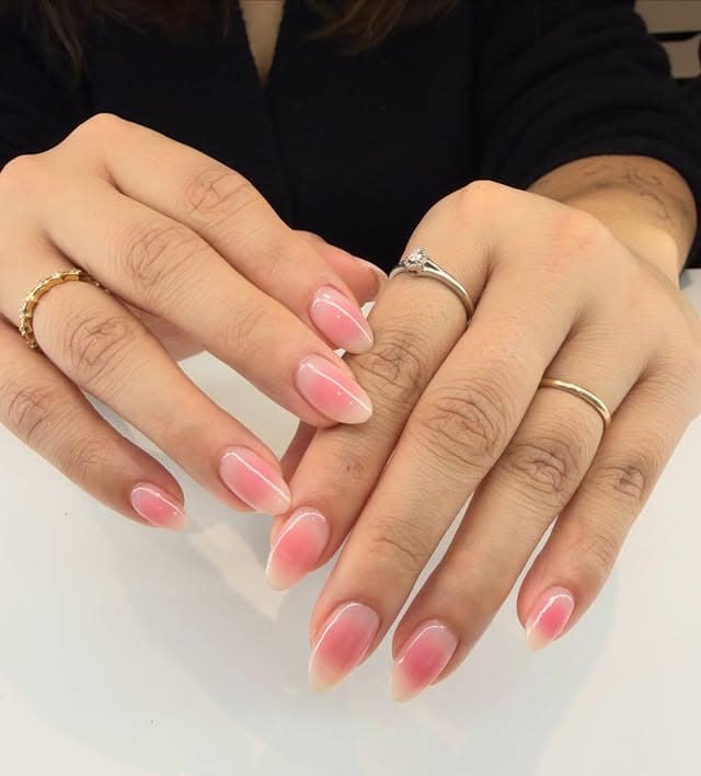 3. Soft Pink Aura Almond Nails - nature nail ideas