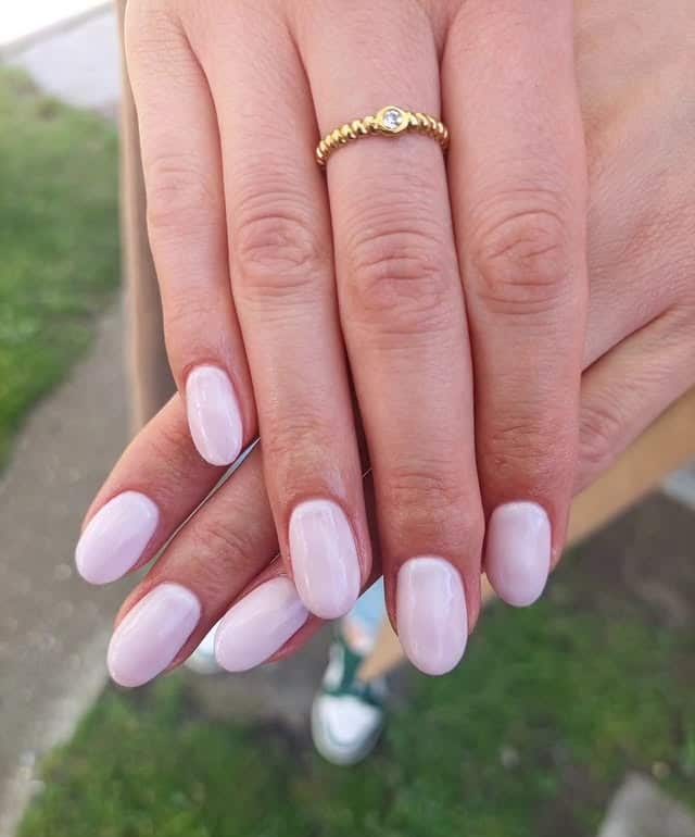 6. Milky White Short Oval Nails - nature nail ideas