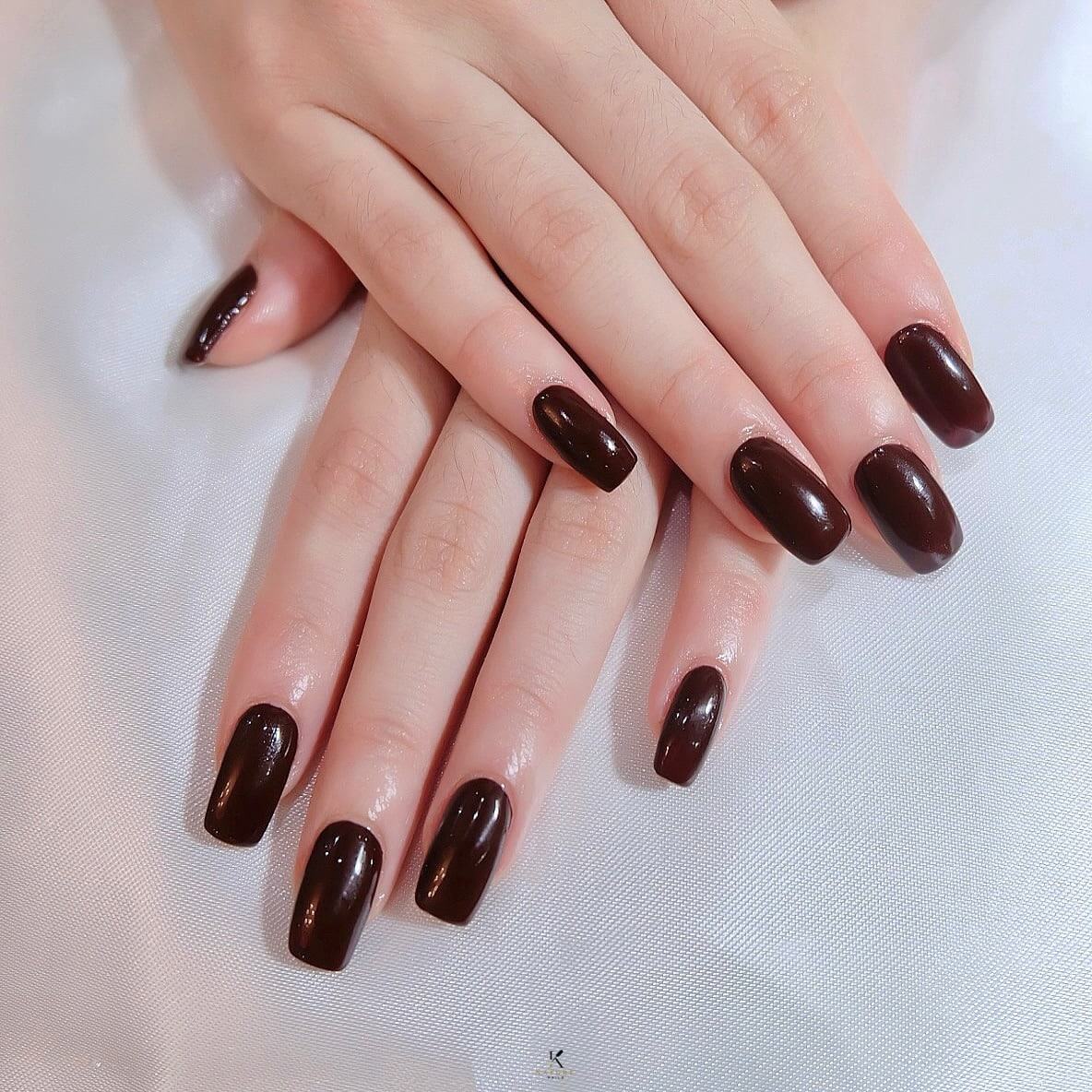 11. Espresso Brown Glossy Oval Nails - nature nail ideas