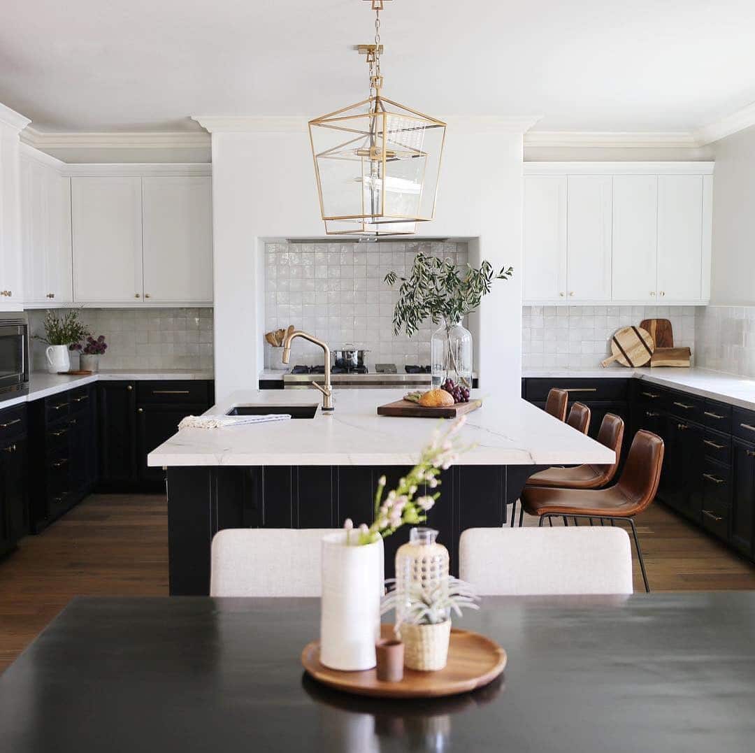 1. Black and White Kitchen With Gold Lantern Lighting - white and gold kitchen ideas