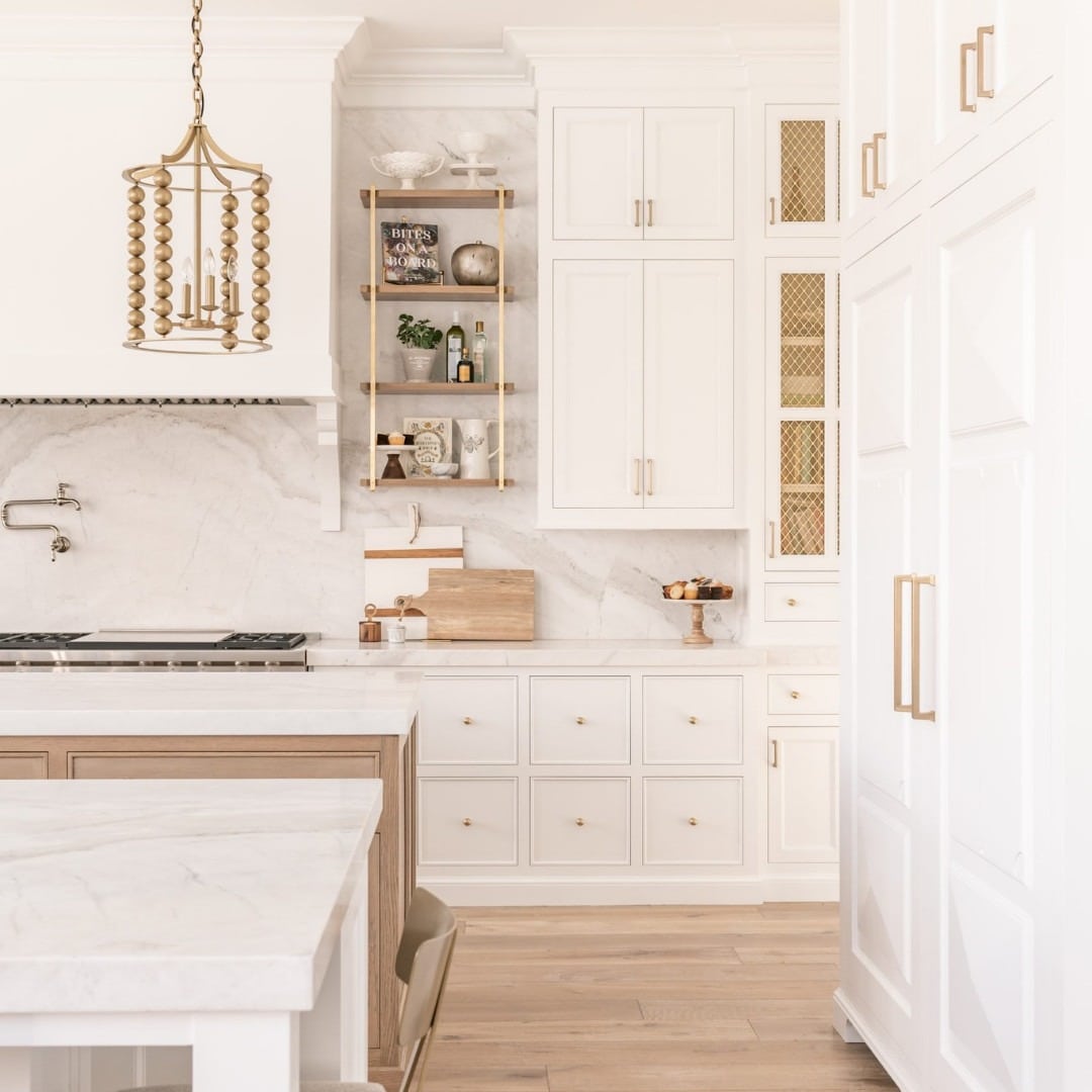 2. Soft White Kitchen With Gold Beaded Chandelier - white and gold kitchen ideas