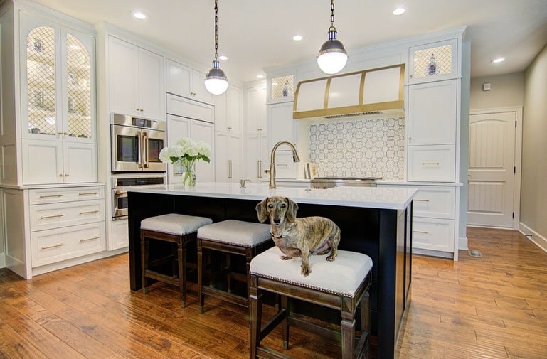 8. White Kitchen With Gold Mesh Cabinet Inserts - white and gold kitchen ideas