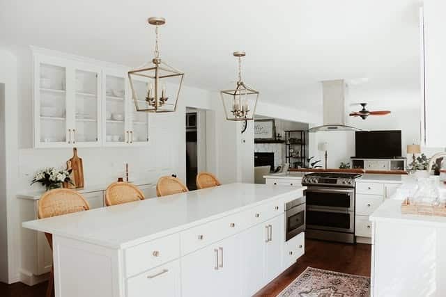 9. White Kitchen With Double Lantern Pendants - white and gold kitchen ideas