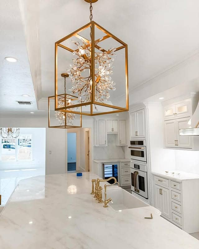 11. White Marble Kitchen With Gold Lantern Chandeliers - white and gold kitchen ideas