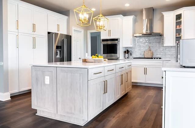 20. White and Wood Kitchen With Gold Lantern Pendants - white and gold kitchen ideas