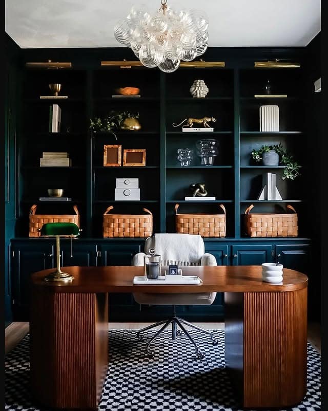 3. Dark Navy Library Office with Brass Accents - professional office decor ideas