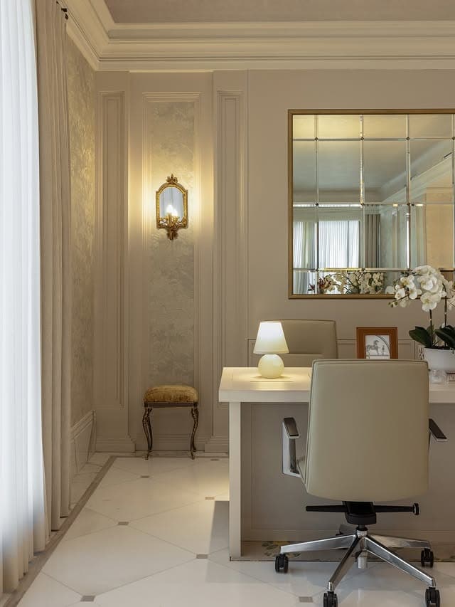 4. Soft Ivory Office with Classic European Influence - professional office decor ideas