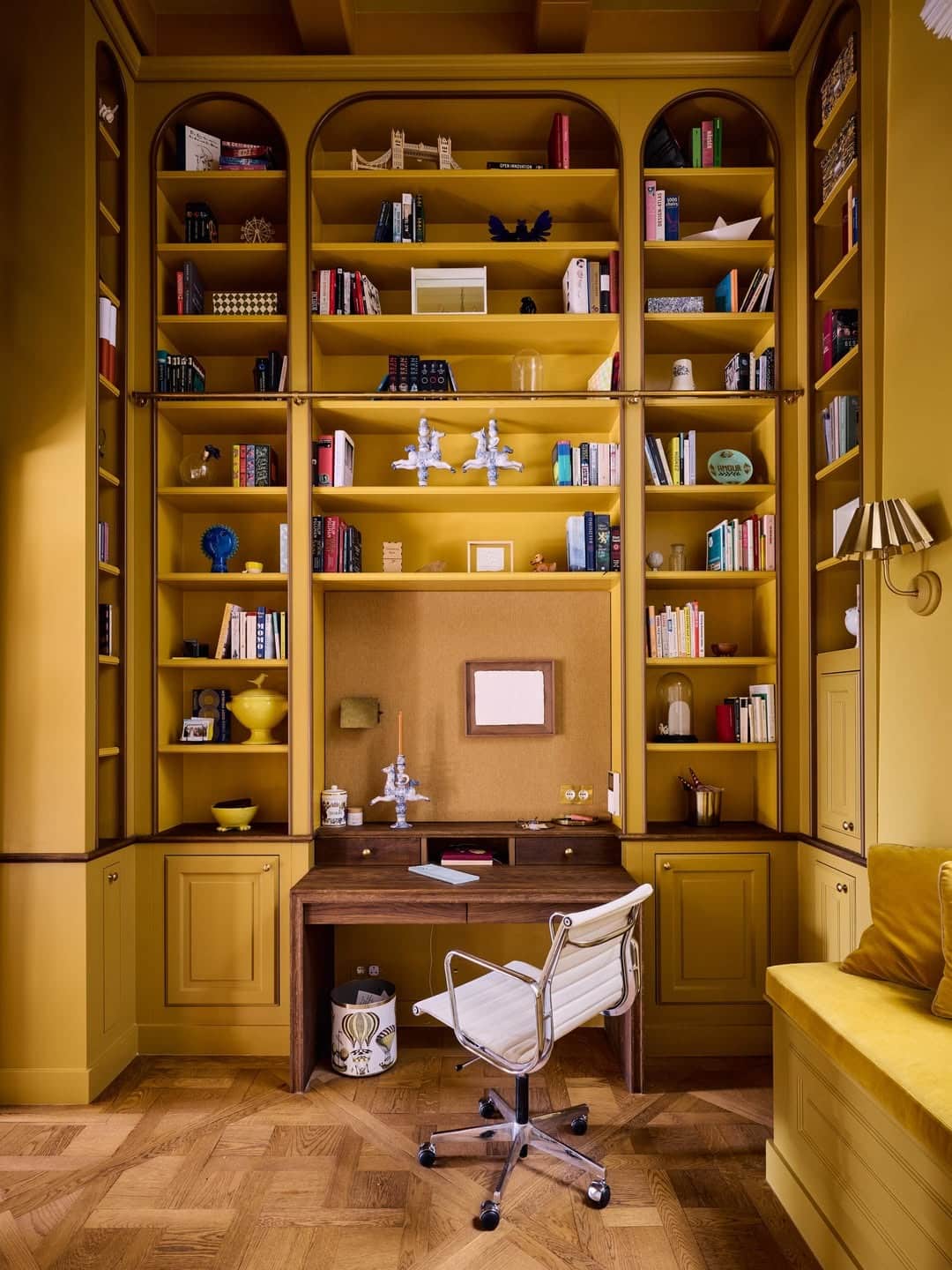 7. Mustard Yellow Reading Office with Custom Built-Ins - professional office decor ideas