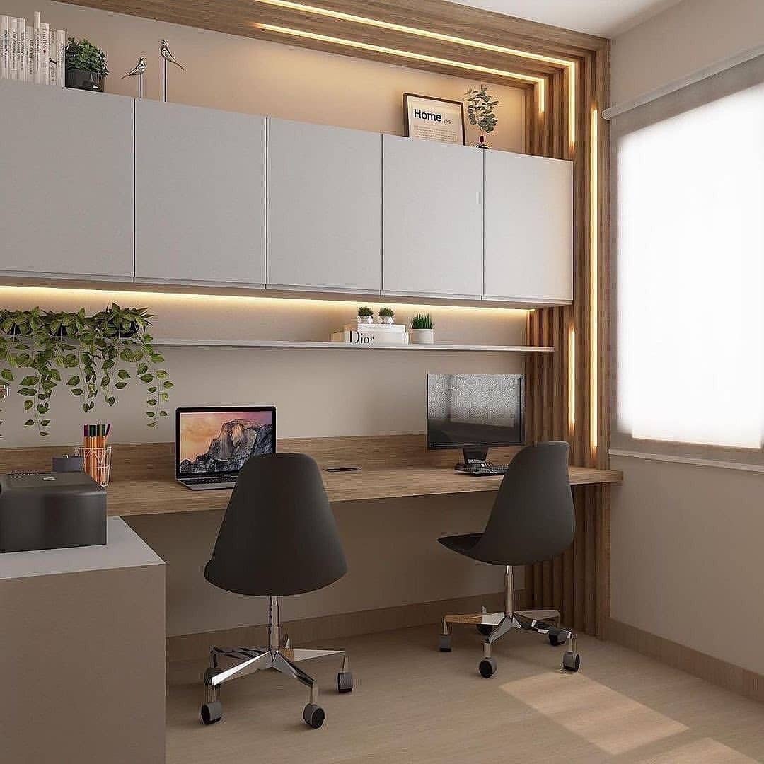 14. Soft Beige Dual Workspace with Floating Cabinetry - professional office decor ideas
