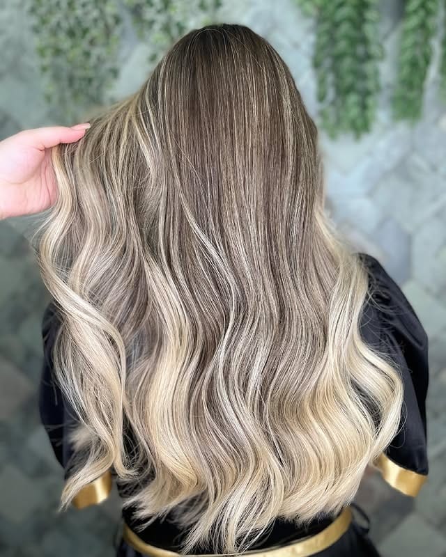 1. Smoky Pearl Blonde Balayage Waves - Pearl Blonde Hair Color