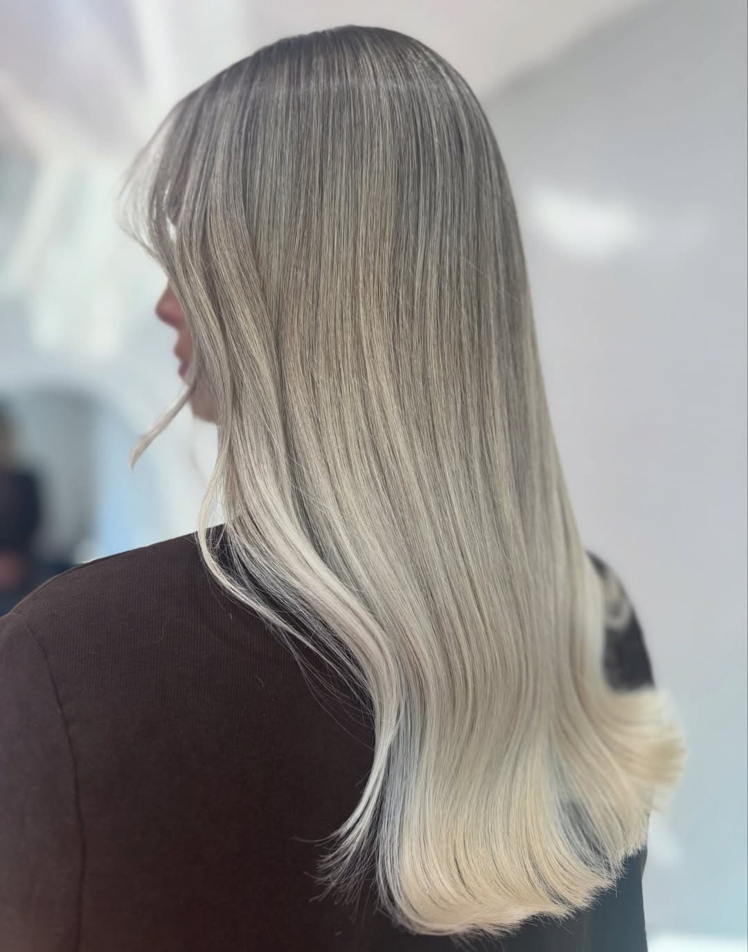 7. Silky Pearl Blonde Straight Layers - Pearl Blonde Hair Color